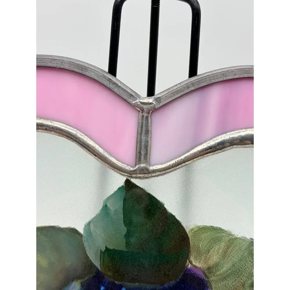 Stained glass heart. With a hand painted floral design.